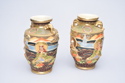 Lot 470 - A pair of Japanese Kyoto ware relief moulded vases