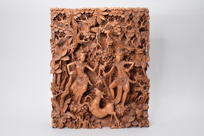 Lot 67 - A Balinese carved wood panel
