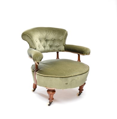 Lot 202 - A Victorian armchair with fluted walnut supports and a buttoned back