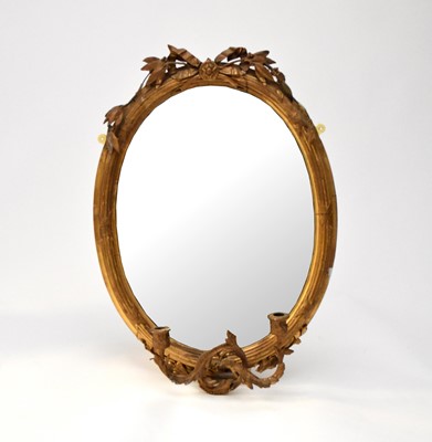 Lot 203 - A small Victorian gilt gesso oval girandole