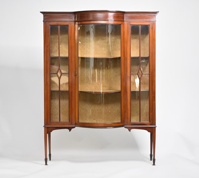 Lot 611 - An Edwardian inlaid mahogany glazed bow-front display cabinet