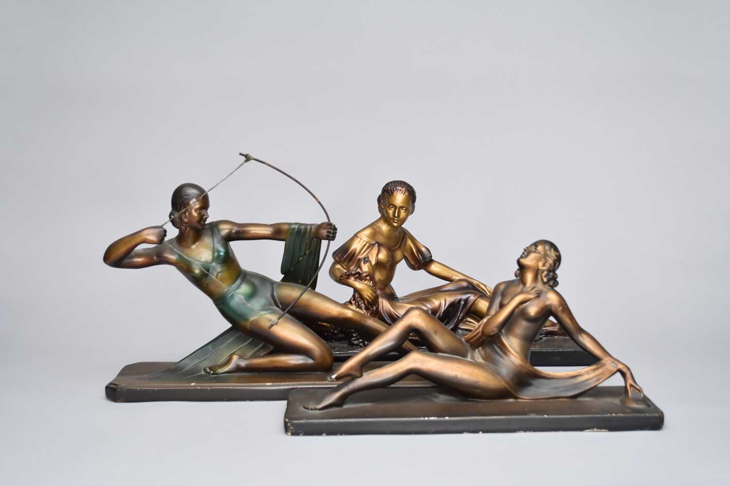 Lot 493 - Four various art deco plaster figures
