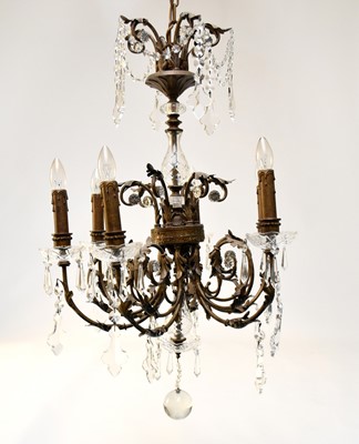 Lot 166 - A reproduction gilt metal and cut glass six light chandelier
