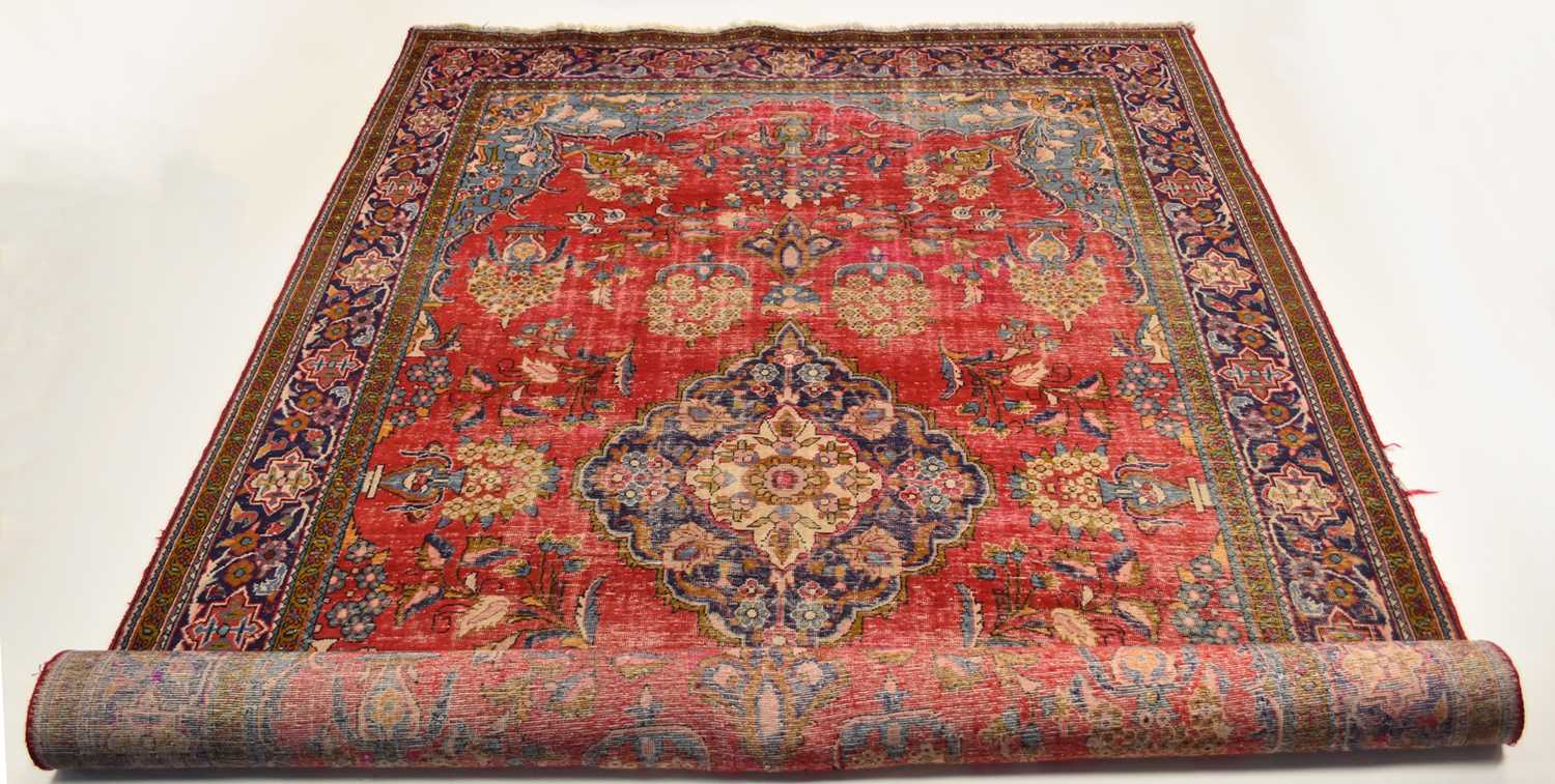 Lot 253 - An Indian carpet