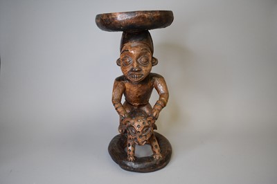 Lot 84 - A West African tribal stool
