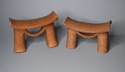 Lot 83 - A pair of East African tribal wood headrests