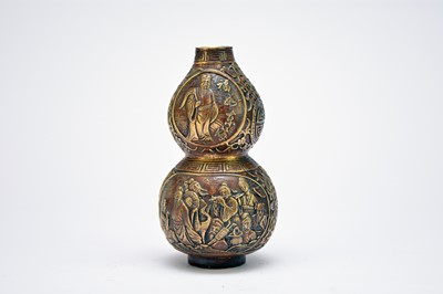 Lot 610 - A Chinese bronze double gourd vase