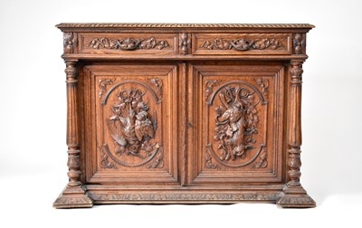 Lot 243 - A North European carved oak cabinet sideboard