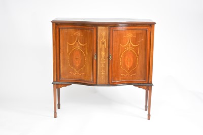 Lot 491 - An Edwardian inlaid mahogany bow-front cabinet or sideboard base