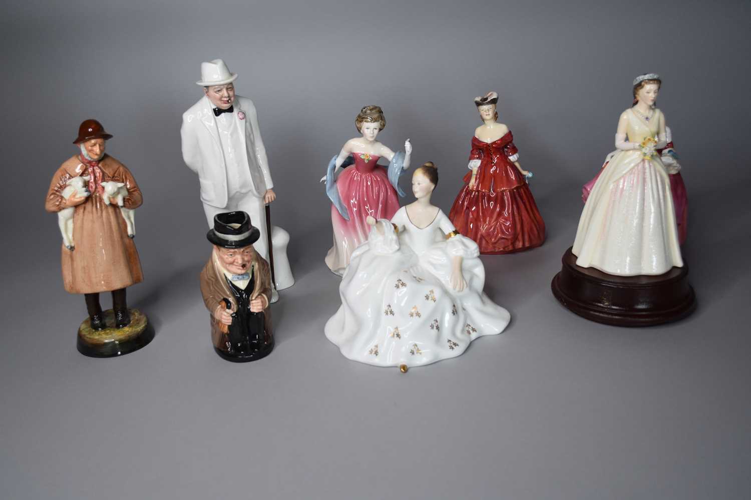 Lot 426 - Eight Royal Doulton figures