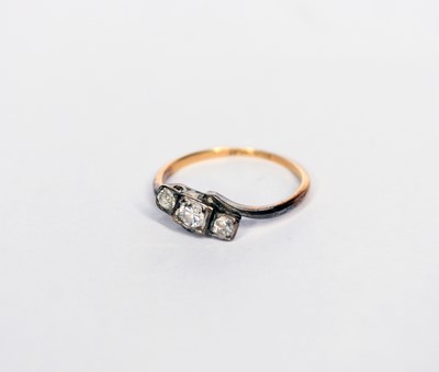 Lot 130 - A three stone graduated diamond ring