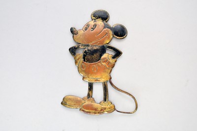 Lot 416 - A 1930s stamped metal figure of Mickey Mouse (car radiator mascot), 14.5cm long