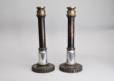 Lot 423 - Of industrial interest: a pair of steel and brass candlesticks, made from industrial parts (2)