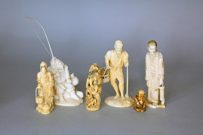 Lot 319 - A group of Japanese ivory okimono and a netsuke