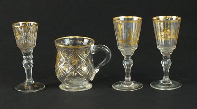 Lot 279 - Three 18th century gilded drinking glasses and a mug