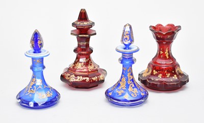 Lot 244 - Four late 19th century Bohemian scent bottles