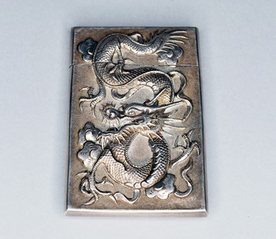 Lot 336 - A Chinese silver card case embossed with dragons