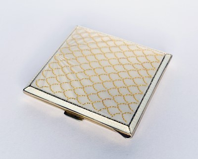Lot 335 - A silver gilt and enamel cigarette case