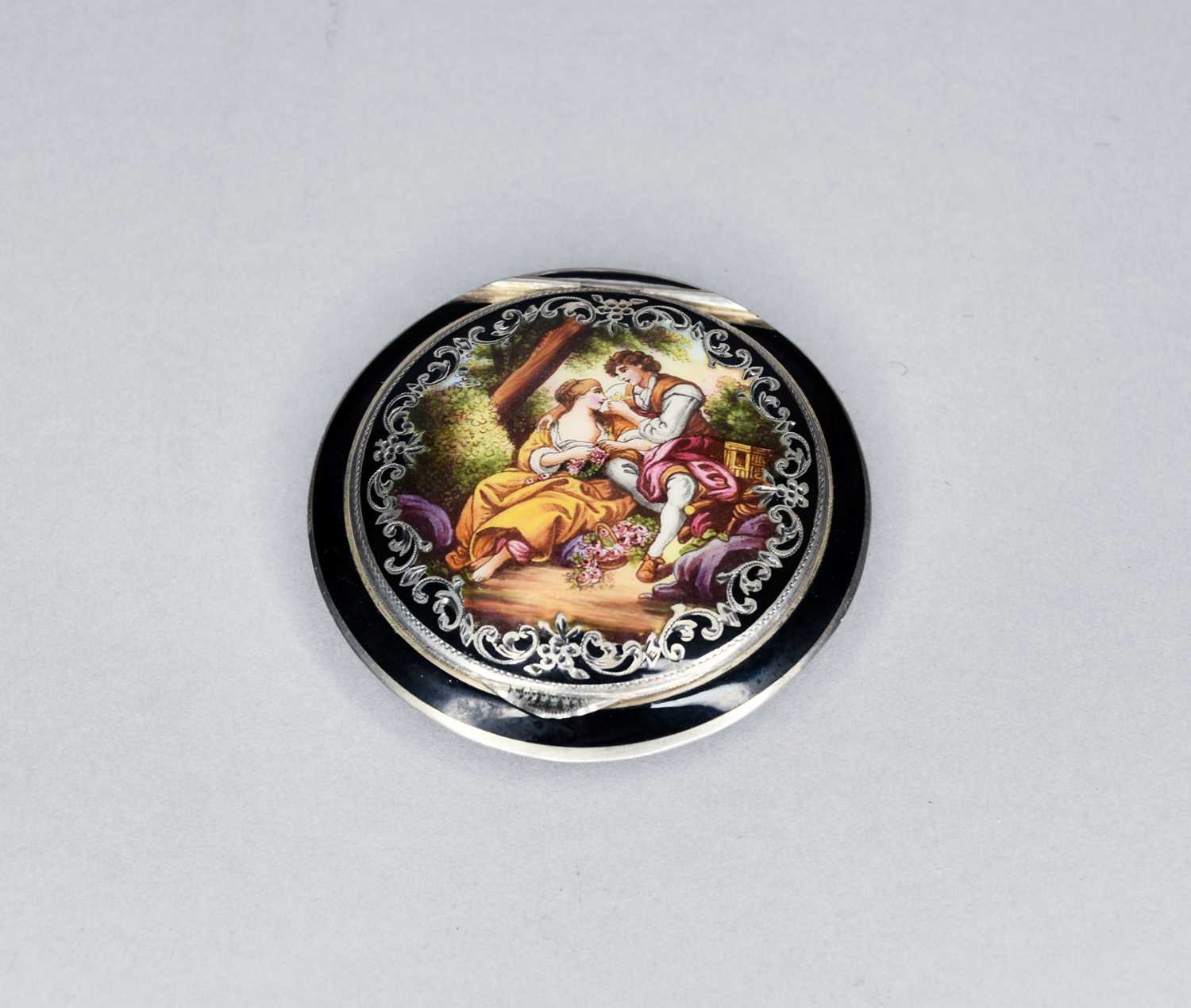 Lot 329 - An Austrian silver and enamel circular compact