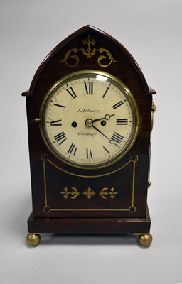 Lot 575 - A 19th century mahogany arch-top bracket or mantel clock, J. Tilbury of Guernsey