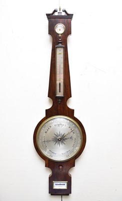 Lot 579 - A George III mahogany wheel barometer