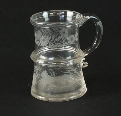 Lot 299 - Engraved glass mug circa 1760-70