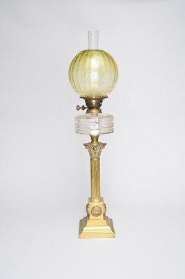 Lot 595 - A Victorian brass Corinthian column oil lamp