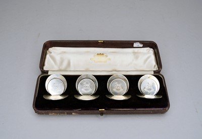 Lot 350 - An Edwardian cased set of four silver menu holders