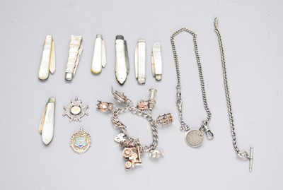Lot 325 - A collection of silver folding knives and a bracelet