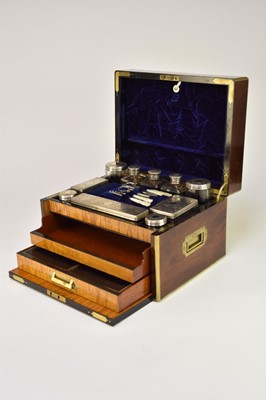 Lot 426 - A Victorian brass-inlaid rosewood dressing case with silver fittings