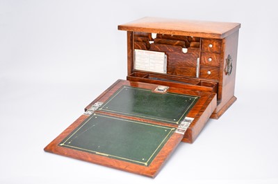 Lot 504 - An Edwardian oak table-top stationary and writing box