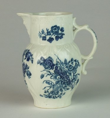 Lot 258 - A small Caughley 'Bouquets' cabbage leaf moulded jug