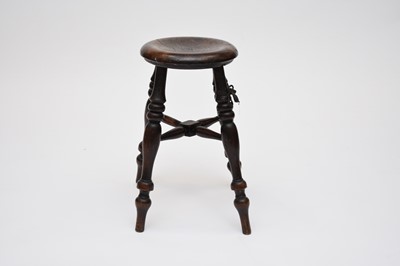 Lot 600 - An elm and oak stool