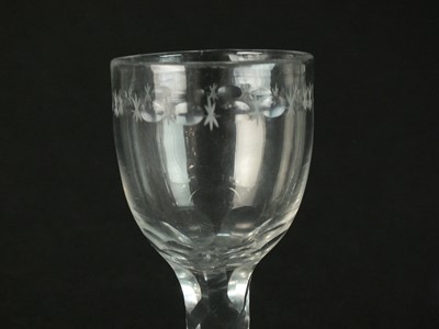 Lot 176 - Three late 18th-century/early 19th century facet-cut stem wine glasses