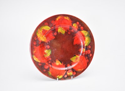 Lot 428 - A Moorcroft flambe plate