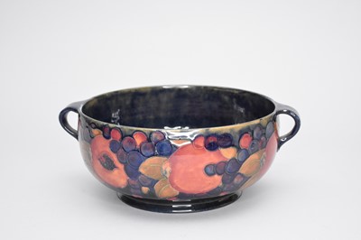 Lot 430 - A large Moorcroft 'Ripe Pomegranate' twin-handled bowl