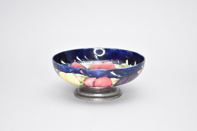 Lot 427 - A Moorcroft 'Wisteria' Tudric pewter mounted bowl