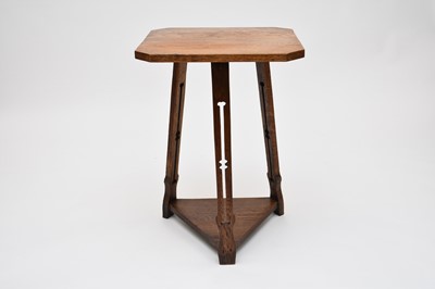 Lot 614 - A good light oak Arts and Crafts cricket type table