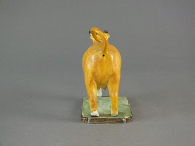 Lot 284 - An English pearlware cow creamer, early 19th century