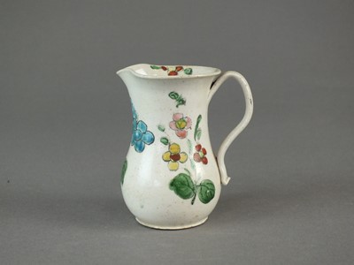 Lot 363 - A Staffordshire saltglaze enamelled cream jug, circa 1760