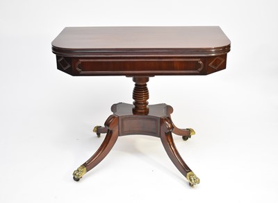 Lot 532 - A 19th century mahogany fold-over tea table