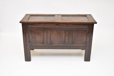 Lot 651 - A nice 17th century oak coffer, with a twin panelled top