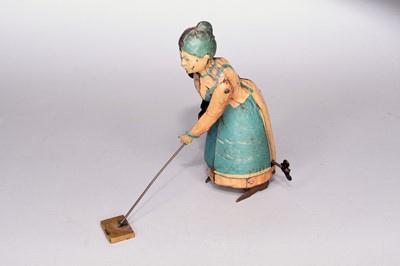 Lot 496 - A German made tin plate clockwork toy 'Bizzie Lizzie'