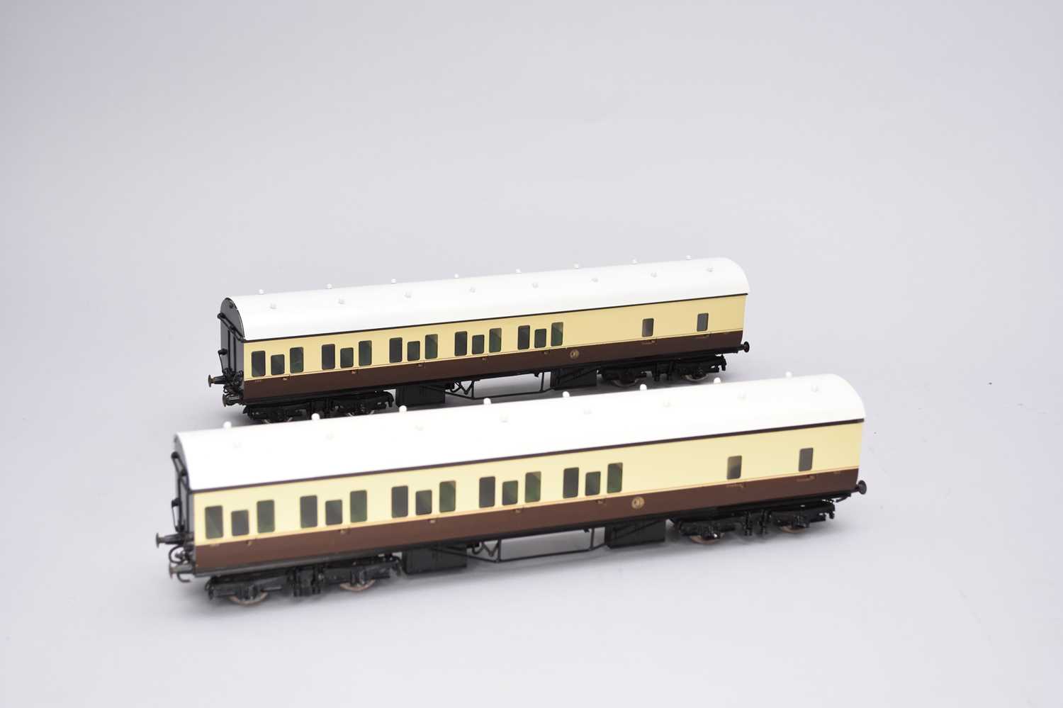 Lot 555 - Two Dapol-type, O-gauge, scale model luggage/passenger carriages