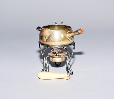 Lot 17 - A miniature silver toddy pan on stand