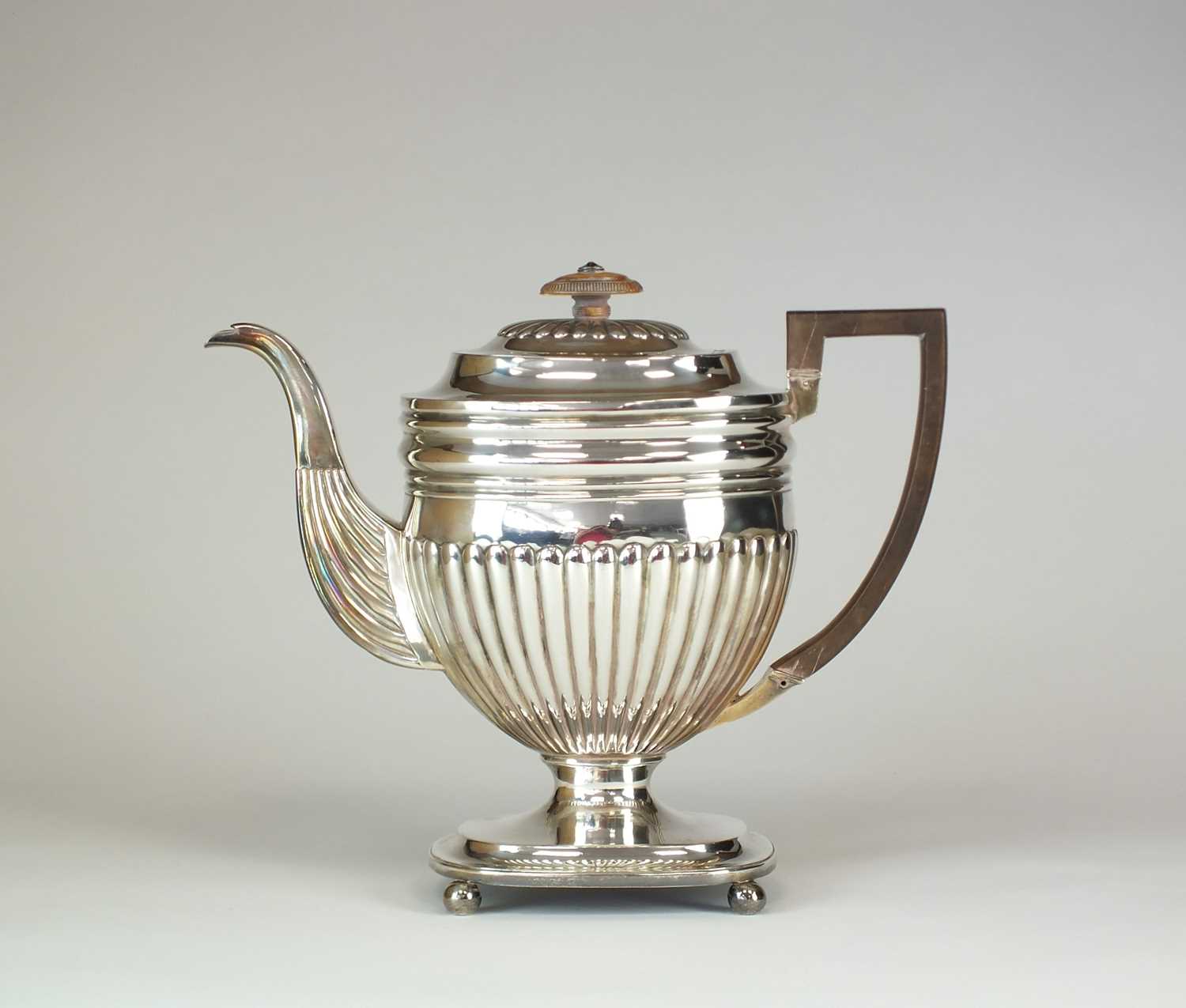 Lot 116 - A George III silver pedestal coffee pot