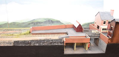 Lot 222 - A large 0-gauge model of a railway station, extending to sidings and the edge of a town