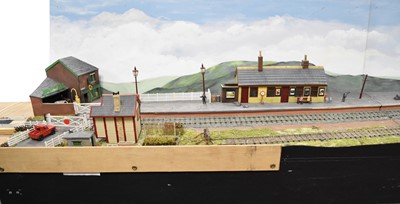 Lot 222 - A large 0-gauge model of a railway station, extending to sidings and the edge of a town