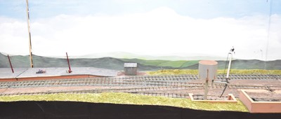 Lot 222 - A large 0-gauge model of a railway station, extending to sidings and the edge of a town