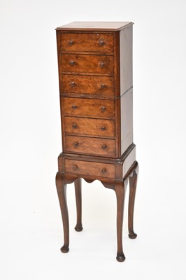 Lot 623 - A novel, figured walnut diminutive tallboy, formerly part of a Victorian dressing table